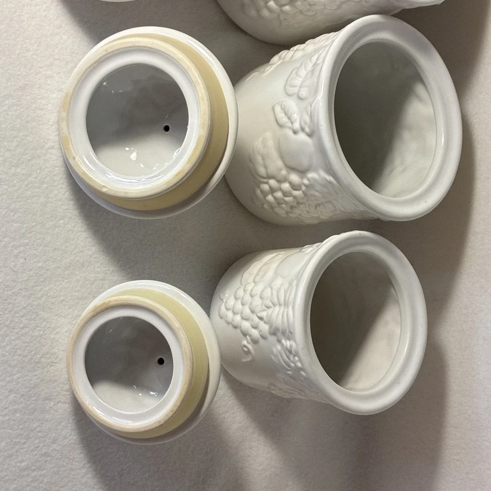 Set of  4 Vintage White Lidded Ceramic Canisters,  Grapevine and Strawberry Lid.
